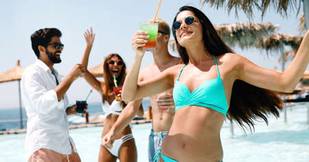 Friends beach party drinks celebration summer vacation conceptの写真素材