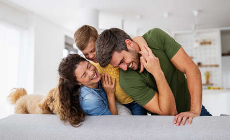 Happy family spending time together, having fun at home