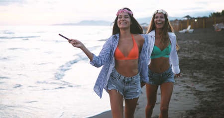 Beautiful sexy woman on beach while summer vacationの写真素材