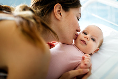 Portrait of a mother with her newborn babyの写真素材