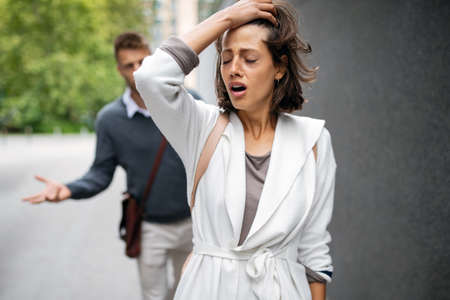Frustrated couple arguing and having marriage problemsの写真素材