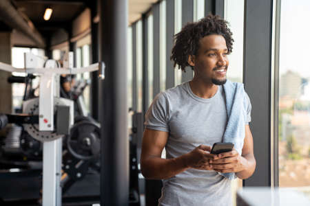 Fitness, sport, training, gym, technology and lifestyle conceptの写真素材