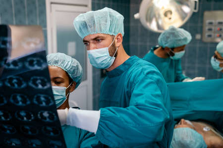 Team of surgeon at work on operating in hospitalの写真素材