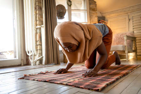 Young muslim woman praying. Islam, muslim religion conceptの写真素材