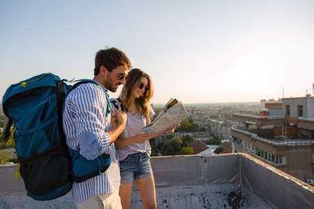 Holiday travel people tourism concept. Smiling couple having fun and enjoying summer vacationの写真素材