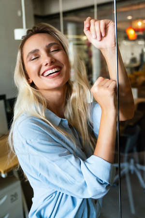 Portrait of happy successful beautiful woman smiling. People skincare fashion conceptの写真素材