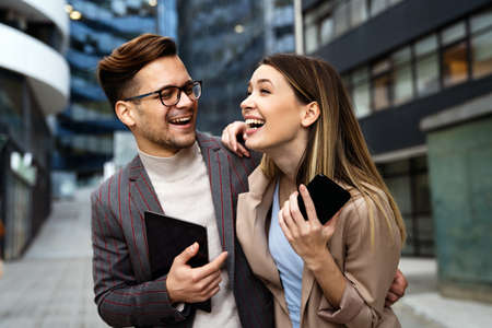 Successful business people, designer enjoying work together. Business people tecgnology conceptの写真素材