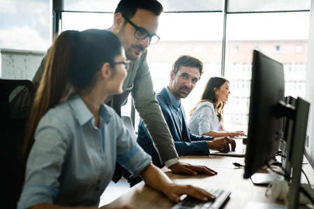 Creative managers crew working with new startup project in office. Team brainstorming.の写真素材