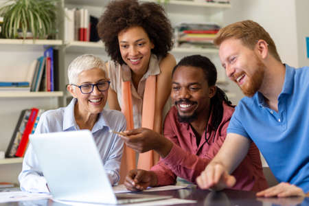 Group of happy business people working as a team at the office on meeting.の写真素材