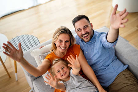 Happy family at home spending time together. People happiness child conceptの写真素材