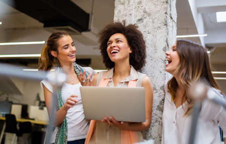 Group of happy friendly multiethnic business people having fun, working together in officeの写真素材