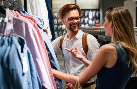 Happy young couple enjoying in shopping, having fun together. People love dating lifestyle conceptの写真素材
