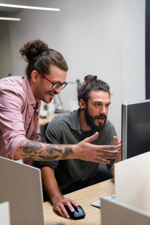 Software engineers working on project and programming in companyの写真素材