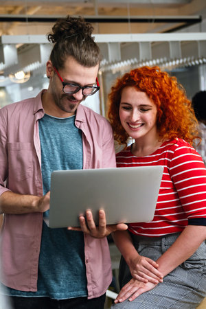 Programmers cooperating at IT company developing apps. People business work office conceptの写真素材