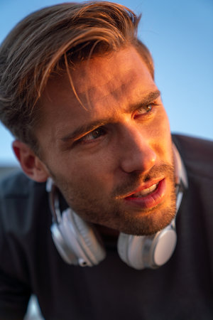 Young fit man take a little break after training outdoor. Fitness sport people lifestyle conceptの写真素材