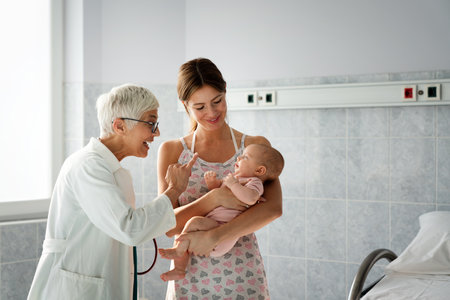 Pediatric doctor exams little baby. Health care, medical examination, people conceptの写真素材