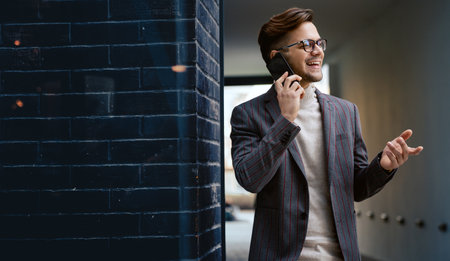 Portrait of successful business man, entrepreneur working in urban backgroundの写真素材