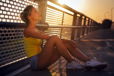 Portrait of fit sporty young woman in city. People sport exercise urban healthy lifestyle conceptの写真素材