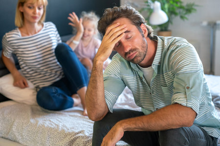 Young family with child having financial problems,depression,crisis. People divorce, stress concept.の写真素材