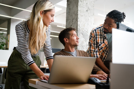 Programmers cooperating at IT company developing apps. People business work office concept