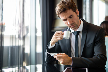 Business man with tablet, technology or corporate communication. Internet, networking professionalの写真素材