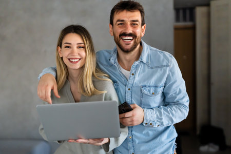 Portrait of success business people working together in home office. Couple teamwork startup conceptの写真素材