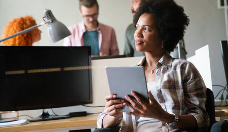 Portrait of happy success black woman working in a busy modern workplace, Startup coworker concept