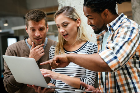 Programmers working in a software developing company office