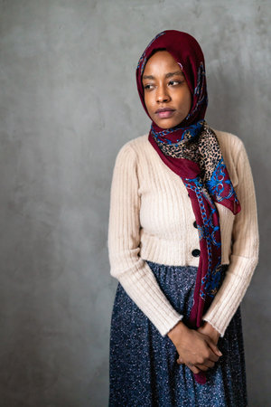 Portrait of a young muslim black woman eastern type in clothes and beautiful headdress