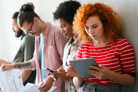 Software, coding and business woman on tablet thinking of data analytics, digital technology.の写真素材