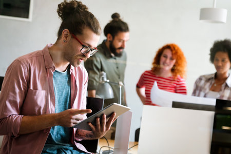 Group of young multiracial business people are working together in modern office. Freelancer conceptの写真素材