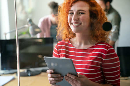 Success business woman with tablet, analytics and developer for startup business website IT softwareの写真素材
