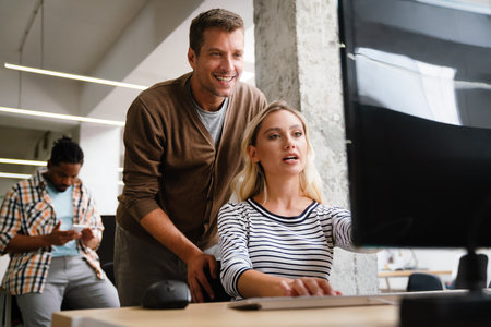Programmers cooperating at IT company developing apps. Business people technology conceptの写真素材