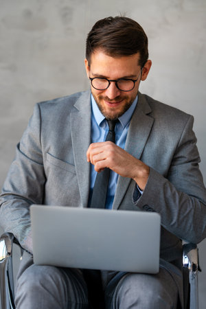 Success young professional businessman investor,manager at workplace working on computer in officeの写真素材