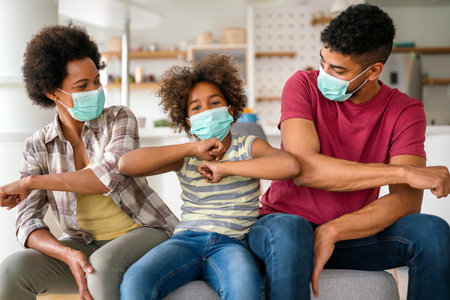 Family is wearing facemasks during coronavirus and flu outbreak. Virus and illness protection, COVIDの写真素材