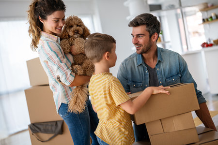 New home, box and parents with child in new house, property mortgage and real estate investment.の写真素材