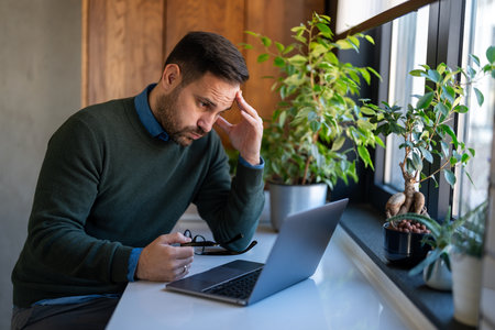 Stressed business man crypto trader broker investor analyzing stock exchange market crypto tradingの写真素材