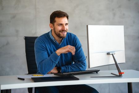 Happy professional business man company employee, young entrepreneur, smiling businessman workingの写真素材
