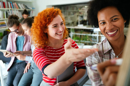 Happy coworker startup people working and having meeting with friendly diverse colleagues in office.の写真素材