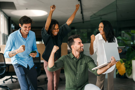 Success group of multiethnic entrepreneurs and business people achieving goals in corporate officeの写真素材
