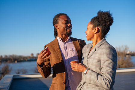 Loving interracial couple spending time together outdoors.の写真素材