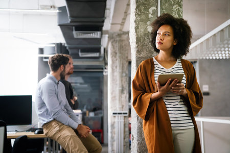Success black woman with tablet, analytics and developer for startup business website IT softwareの写真素材