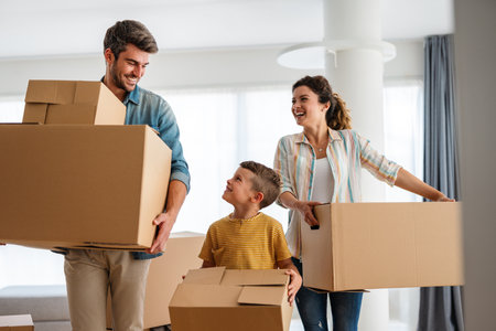 New home, box and parents with child in new house, property mortgage and real estate investment.の写真素材