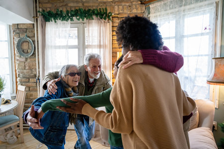 Happy multiethnic multi-generational family enjoying Christmas time together. People love concept.の写真素材