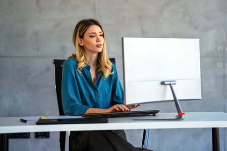 Happy professional business woman company employee, young entrepreneur smiling businesswoman workingの写真素材