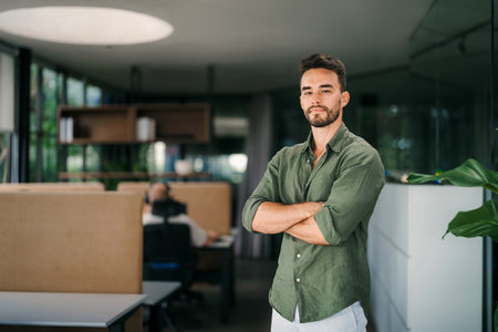 Young male startup ceo leader business man, success people standing in office.の写真素材