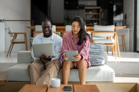 Online entertainment and social media. Couple enjoying the digital world, staying connected onlineの写真素材