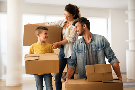New home. Parents with child moving in new house, property mortgage and real estate investment.の写真素材
