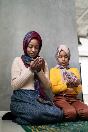 Portrait of muslim mother with child during islamic religious cultural activities