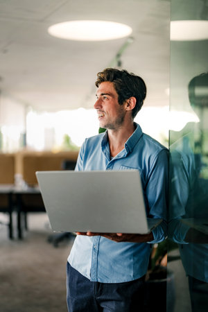 Software engineer using laptop computer with global network connection, Technology, innovation